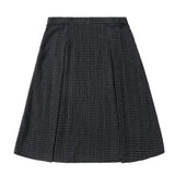 Black, Ivory, and Gold Grid Skirt With Pleating Detail
